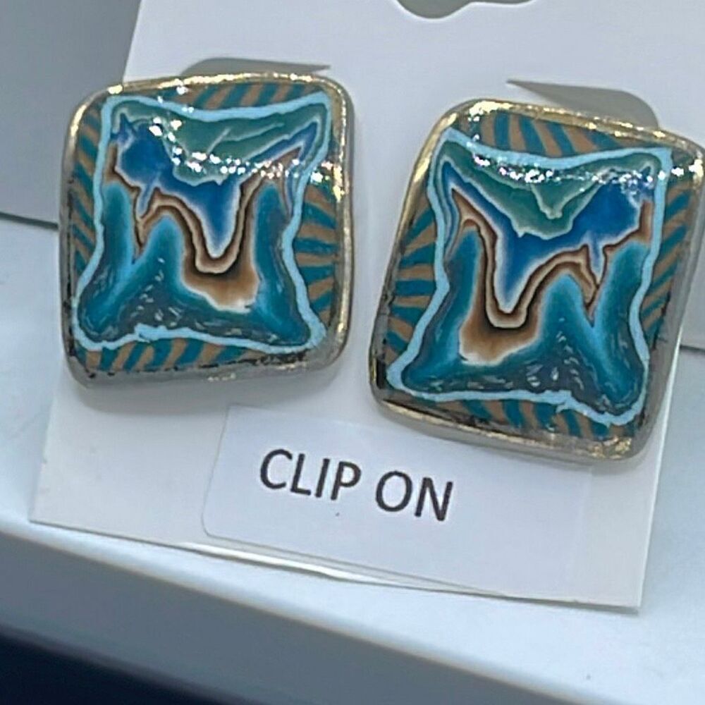 Vintage metal enamel clip style earrings.